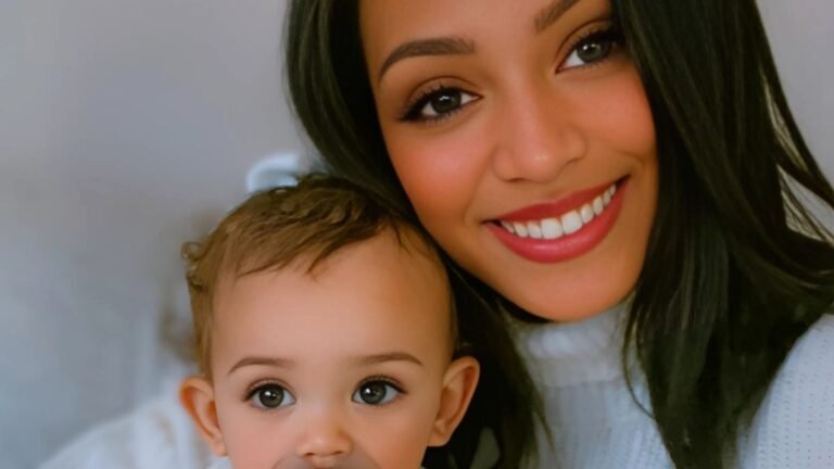 Mother and toddler smiling together on a couch, wearing cozy sweaters with bee and flower embroidery, symbolizing warmth, growth, and modern motherhood